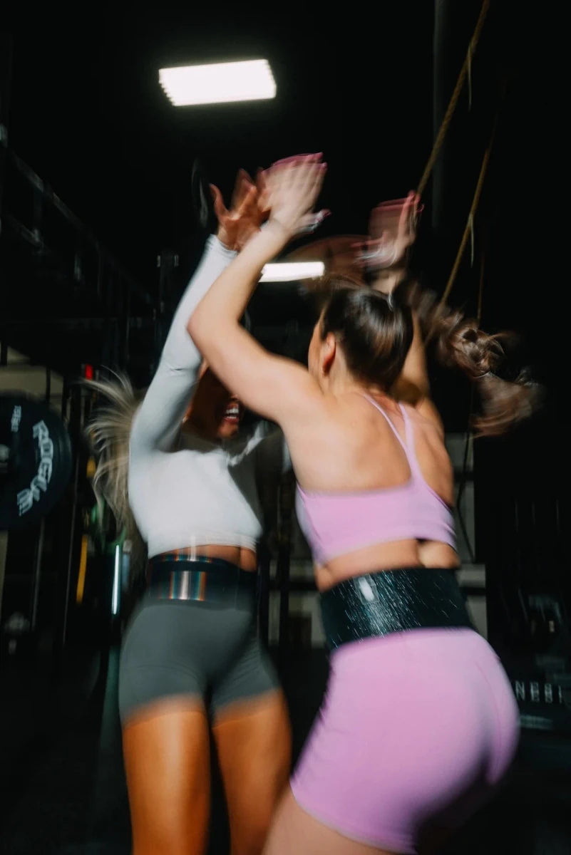 Athletes celebrating a training session together