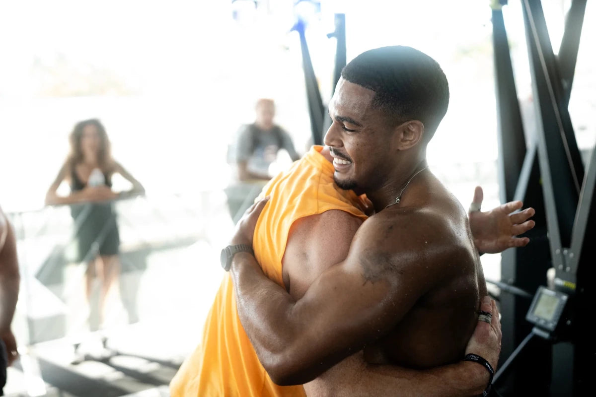 Strength athlete celebrating in a functional fitness gym